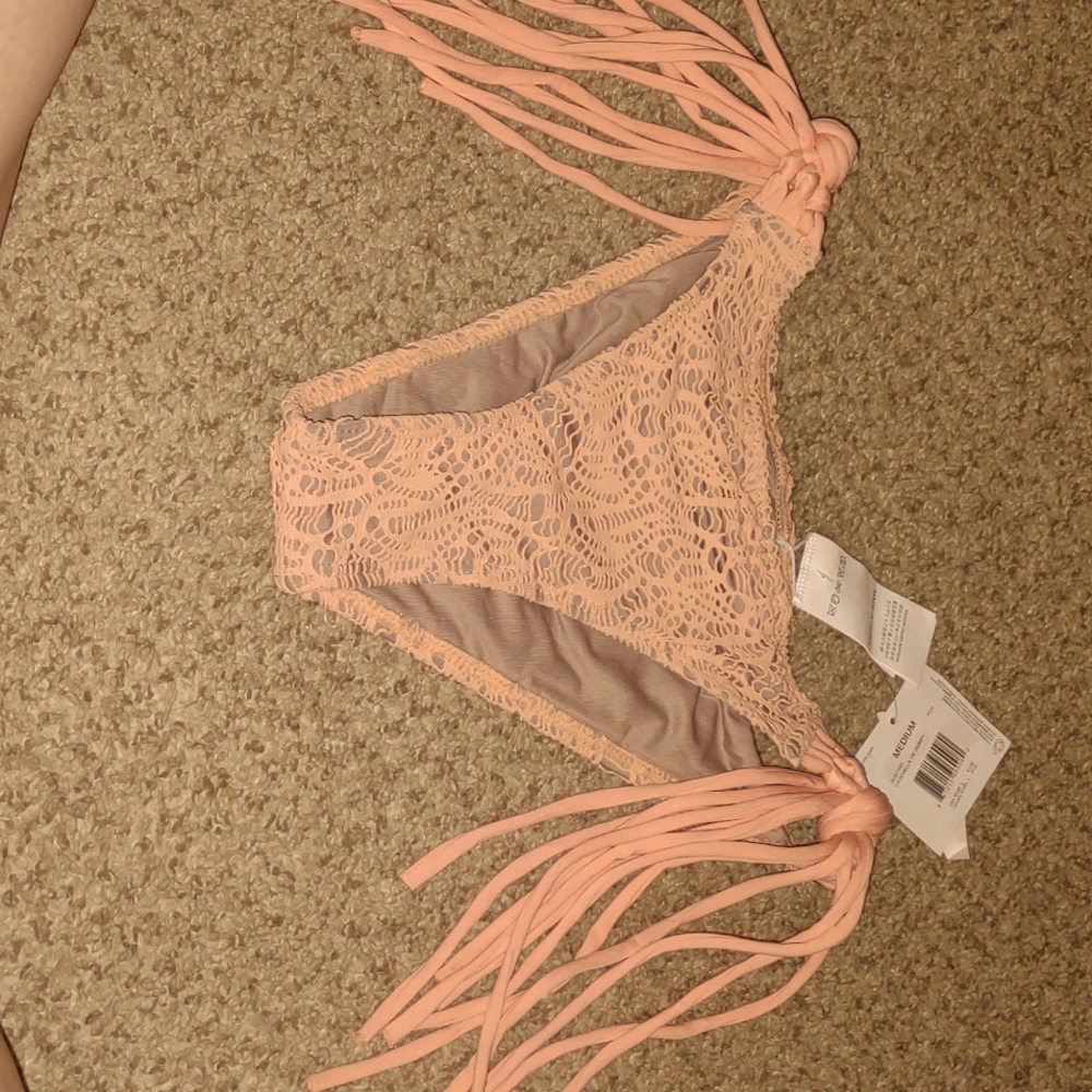 brand new Women's size medium valcom swimming suit bottom
